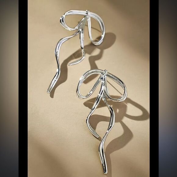 Silver bow Earrings M393 - Picture 1 of 3